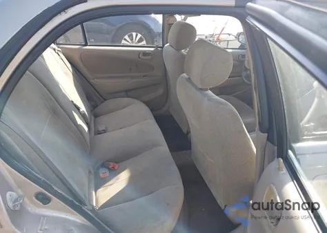 2002 Toyota Corolla Le from USA, damaged, VIN 2T1BR12EX2C572294